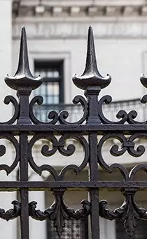 close up detail of wrought iron gate